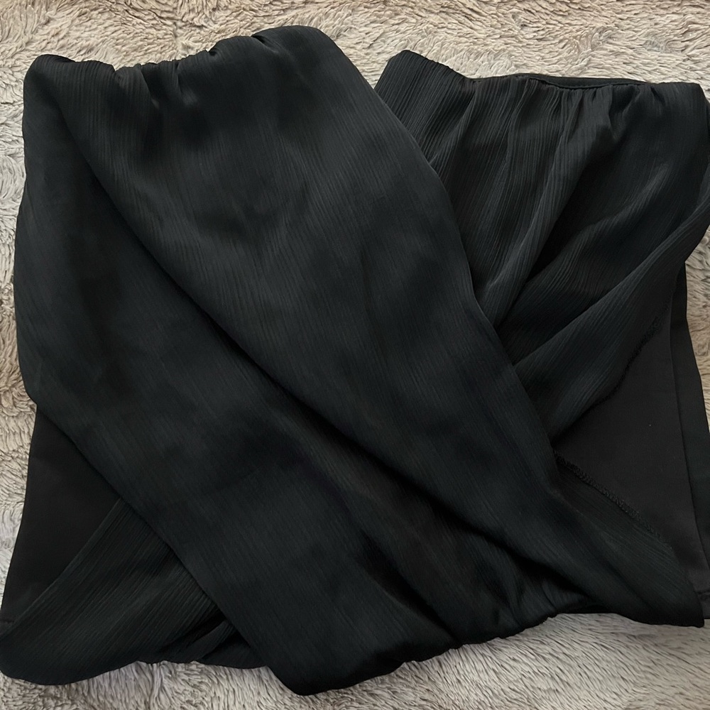 Cute black strapless top. Dress up or down. Only worn once.